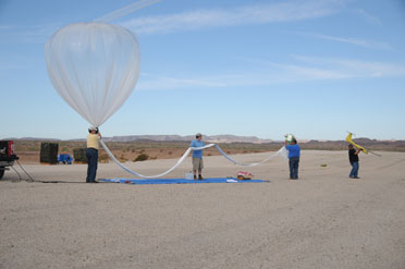 The ADD test crew prepares to launch a weather balloon to carry the Tempest UAV