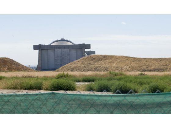 Acres of open space, mounds of dirt and weeds surround the south blimp hangar at Tustin.2010 Photo Jebb Harris OC Register