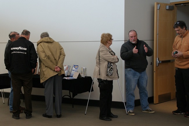 Visitors gather at the Akron-Summit County Main Library Auditorium for the commemorative program