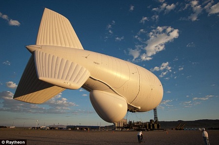 Eye in the sky: The JLENS blimp uses radar to monitor a 340 miles radius around the spit where it is deployed. The complex radar can see well beyond the horizon. Photo: Raytheon/Daily Mail
