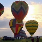 Dozens of balloons were launched from High River