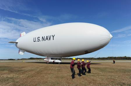Handlers prepare to launch the Navy's MZ-3A manned airship for an orientation flight from Patuxent River, Md. The MZ-3A, assigned to Scientific Development Squadron (VXS) 1 of the Military Support Division at the Naval Research Laboratory, is an advanced flying laboratory used to evaluate affordable sensor payloads and provide support for other related science and technology projects for the naval research enterprise.  U.S. Navy photo by John F. Williams