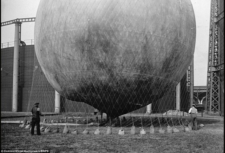 The balloon held in place by weighted netting.