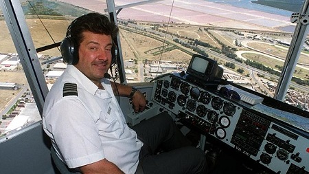 Pilot Captain Mike Nerandzic flying the Goodyear blimp over Adelaide in 1999.  Photo: The Daily Telegraph