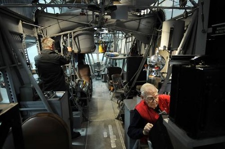 Russ Magnuson of Southington, right, works inside the Goodyear ZNPK-28 Blimp Control Car. When the restoration began, the interior was stripped. Magnuson and his volunteers designed and fabricated accurate reproduction parts to bring the ship back to life.
