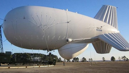 The system requires eight ground crew members to operate. The Aerostat can be tethered to a height of up to 600 metres – about twice the height of One Raffles Place building. Safety measures will also be in place to ensure Aerostat is far from flying aircraft, when deployed. The blimp will also be secured to the ground mooring station with a Kevlar tether, to withstand strong winds and lightning strikes. Photo courtesy of Channel NewsAsia