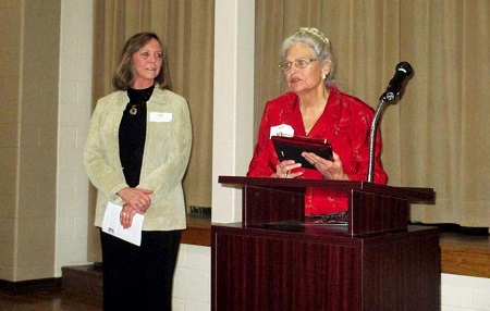 Joan Reisig, recipient of the P. Rendall Brown Lifetime Achievement Award recipient addresses the audience. Ren Brown's daughter, Carol Ault (L) looks on.