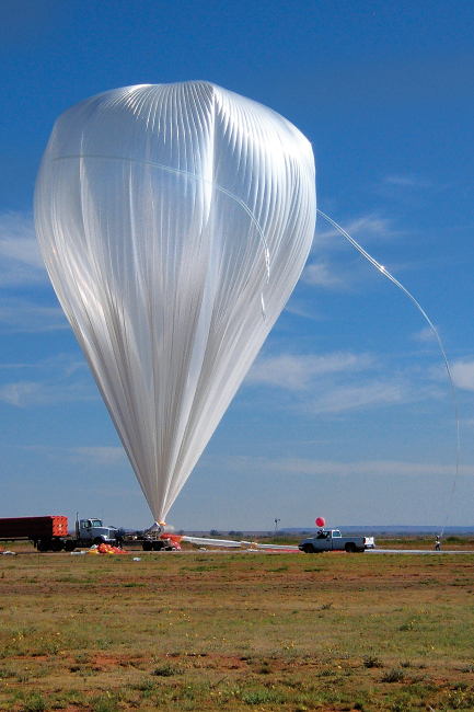 The uppermost part of the BalloonSat project´s balloon is filled with helium before it is launched from Fort Sumner on May 31, 2008. It reached an altitude of 120,000 feet. Photo courtesy of NMSU