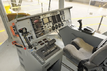 Key features of the cockpit include the right-hand fly-by-light flight control stick and, nearer the camera, throttle and thrust vectoring controls.  Credit: Mark Wagner, Aviation-Images.com