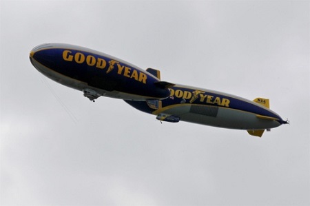 Two Goodyear airships, Wingfoot One (right) and Spirit of Innovation, conduct a tandem flight over the downtown Akron area on Wednesday.  Photo: Ed Suba Jr./Akron Beacon Journal