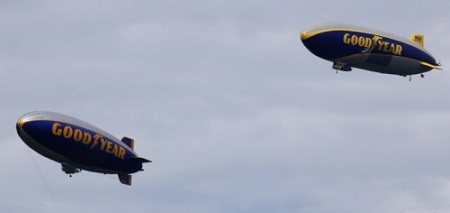 Wingfoot One (right) and Spirit of Innovation, conduct a tandem flight over the downtown Akron area on Wednesday.  Photo: Ed Suba Jr./Akron Beacon Journal