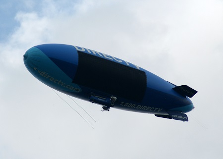 The DirecTV Blimp flies north along Route 8 between Akron and Cleveland, Ohio.