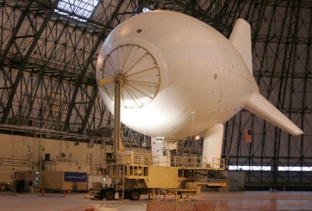 This February 2009 file photo shows the aerostat on the mooring station of the Persistent Threat Detection System in the Lockheed Martin Airdock in Akron. Photo: Mike Cardew/Akron Beacon Journal 