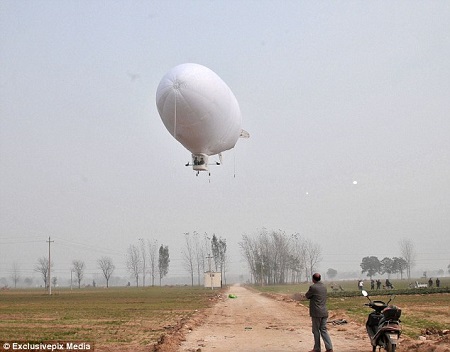 Success: Shi Songbo spent four months building a zeppelin (pictured), which he flew for the first time recently. Photo: Exclusivepix Media/Daily Mail