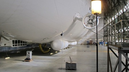 Lift off – Pumped full of helium, Airlander 10 demonstrates its buoyancy within the hangar. It faces several weeks of ground tests before it'll be allowed out to fly. Source: CNN