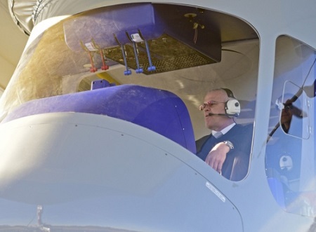 Chief Pilot Fritz Gunter tests the controls while sitting in the gondola of the second new technology Goodyear airship. Photo: David Dermer - Akron Beacon Journal.